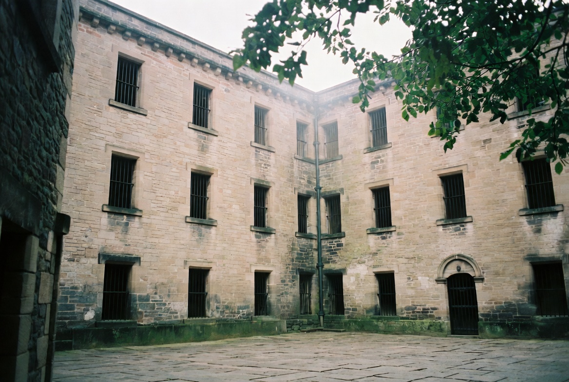 The classical gatehouse and pediment of Downpatrick Gaol.